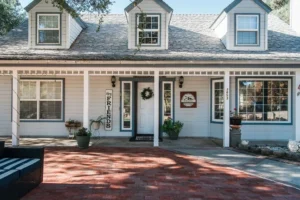 Charming house with front porch and wreath.